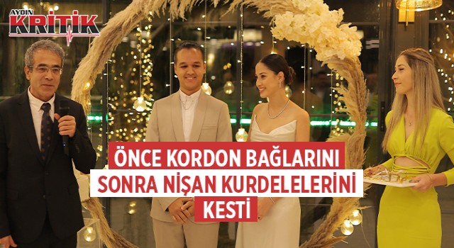 Önce kordon bağlarını, sonra nişan kurdelelerini kesti