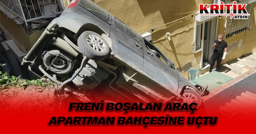 Freni boşalan araç apartman bahçesine uçtu