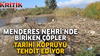 Menderes Nehri’nde biriken çöpler, tarihi köprüyü tehdit ediyor