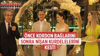 Önce kordon bağlarını, sonra nişan kurdelelerini kesti