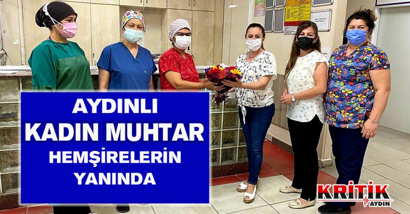 Aydınlı kadın muhtar hemşirelerin yanında